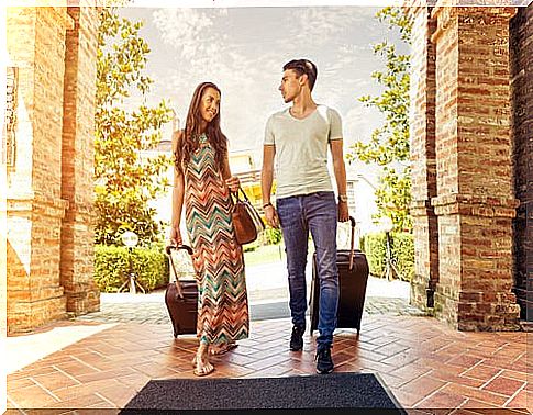 Couple with suitcases