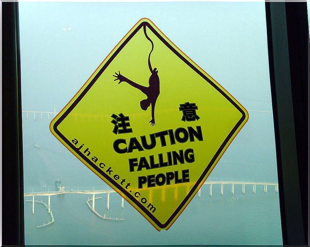 Notice of people bungee jumping at the Macau tower