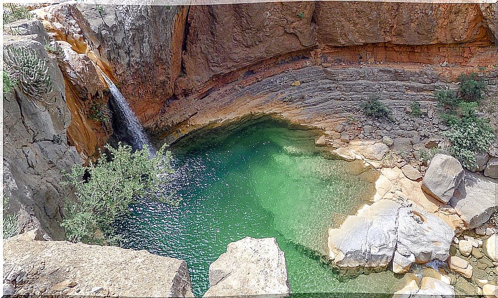 Waterfall and small lagoon in Paradise Valley, Morocco.