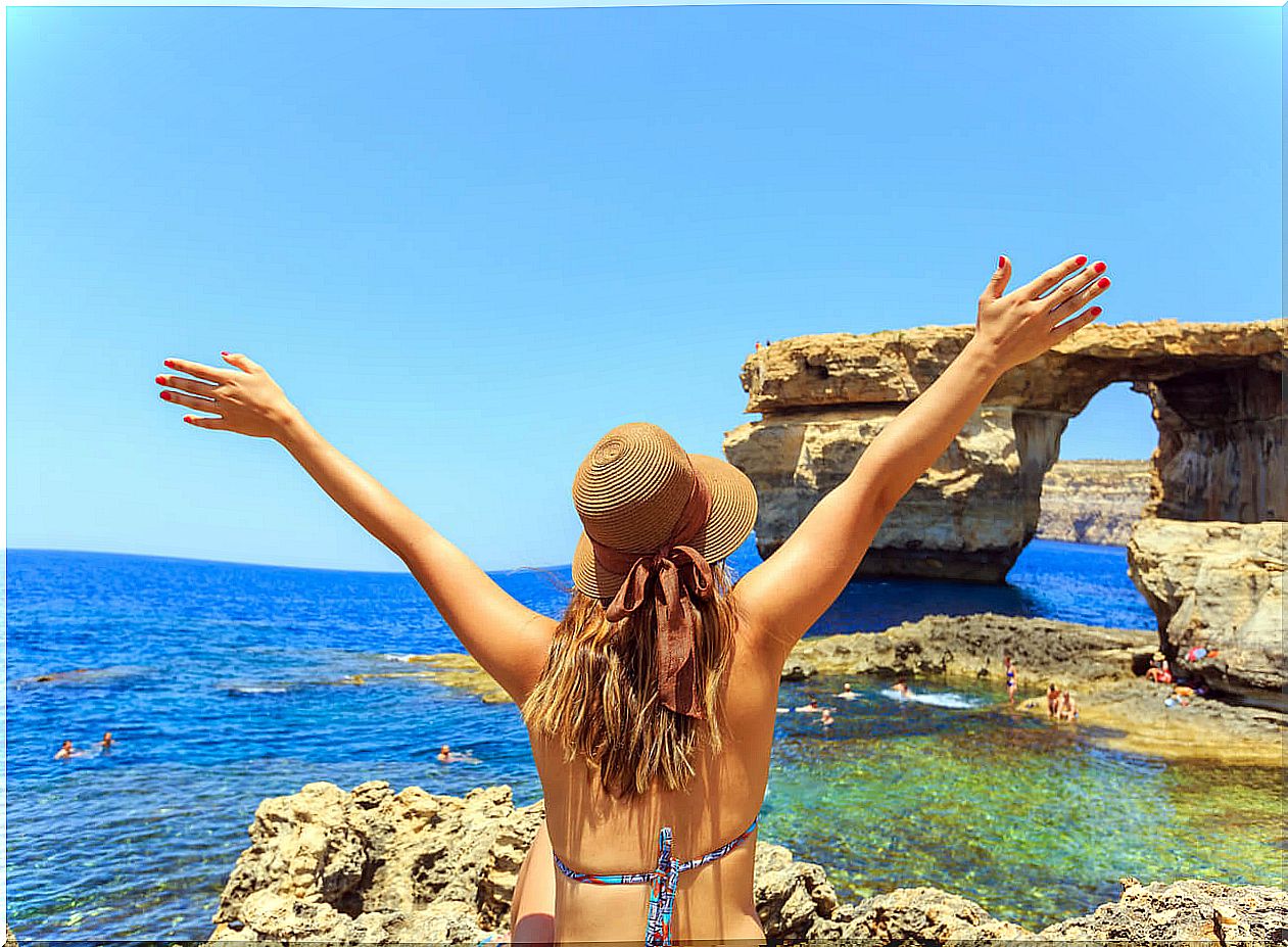 Tourists at the Azure Window of Malta.